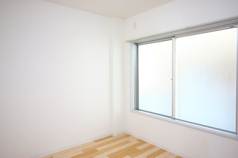 マンションやまと ベッドルーム