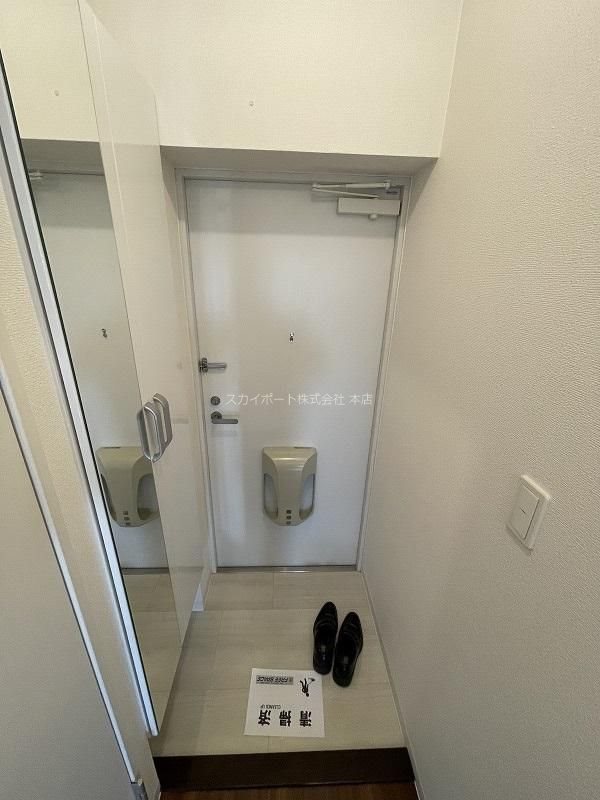 グランソレイユ 玄関