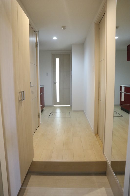 メゾン アイカワ 玄関