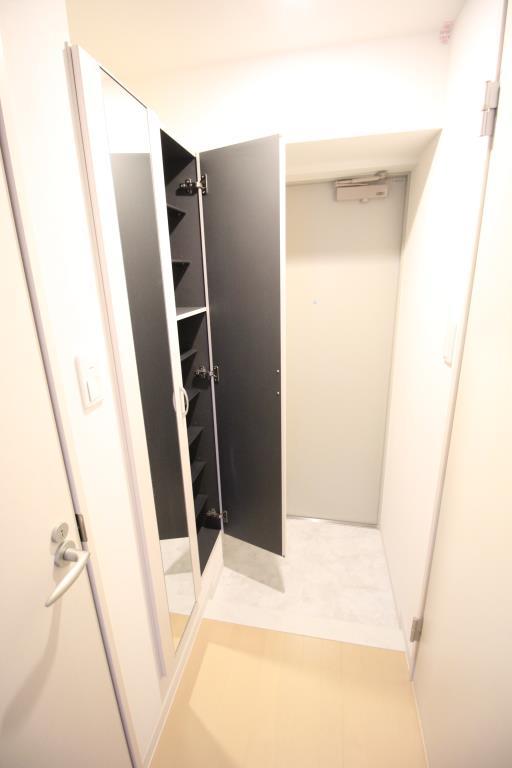 クレシェンテ月島 玄関