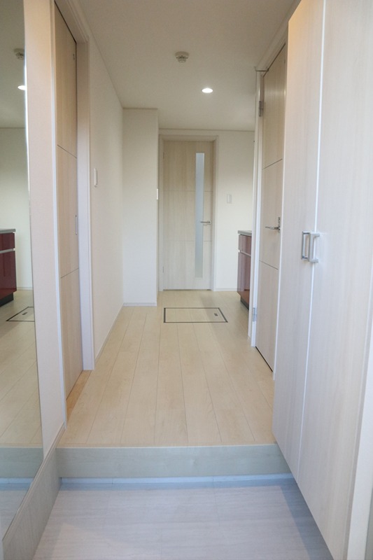 メゾン アイカワ 玄関