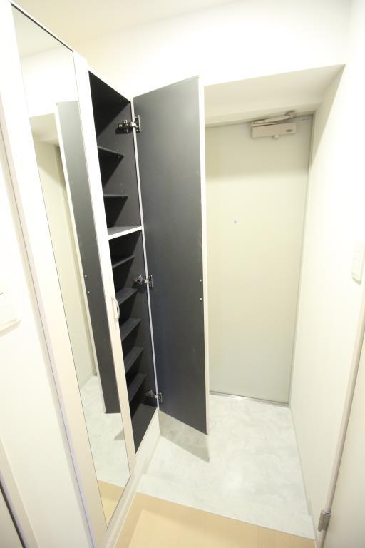 クレシェンテ月島 玄関