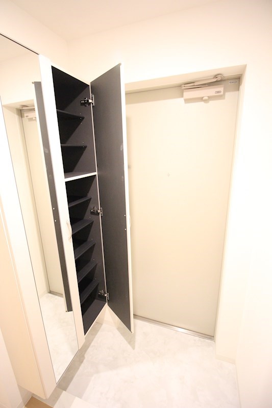 クレシェンテ月島 玄関