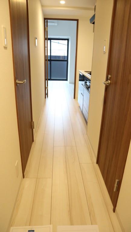 イート アパートメント ヴェリタス 玄関