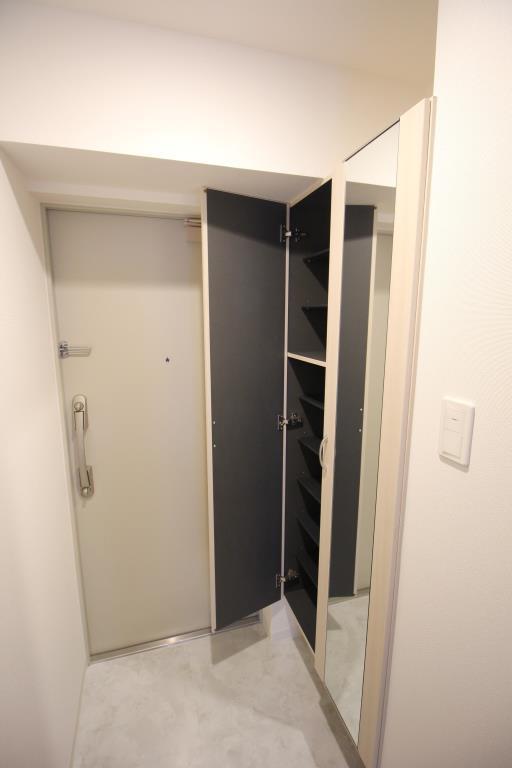 クレシェンテ月島 玄関