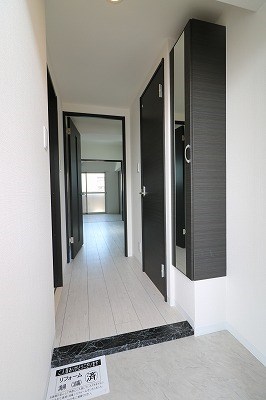 サン・レスポワール十条 玄関