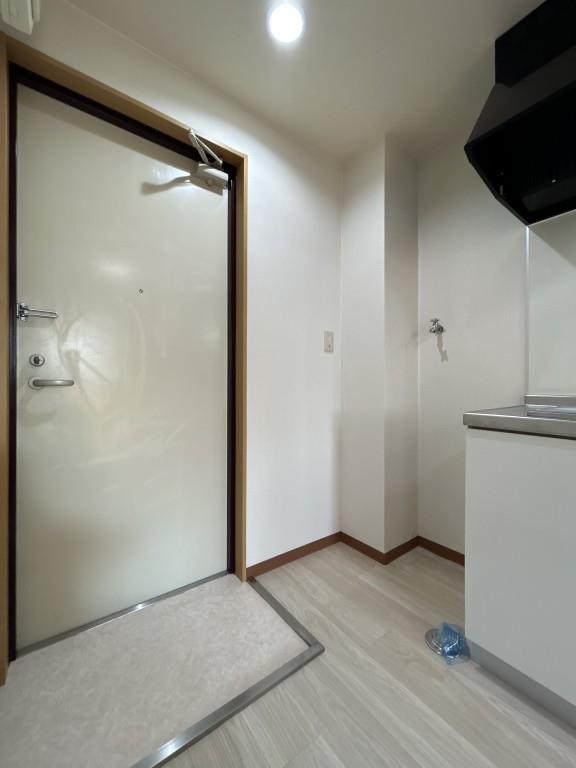 El tercero高野 玄関