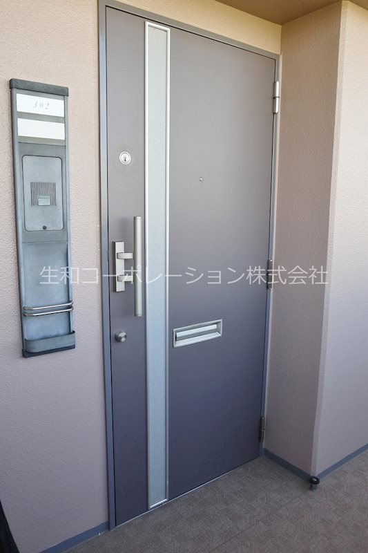ラポール忍ヶ丘 玄関