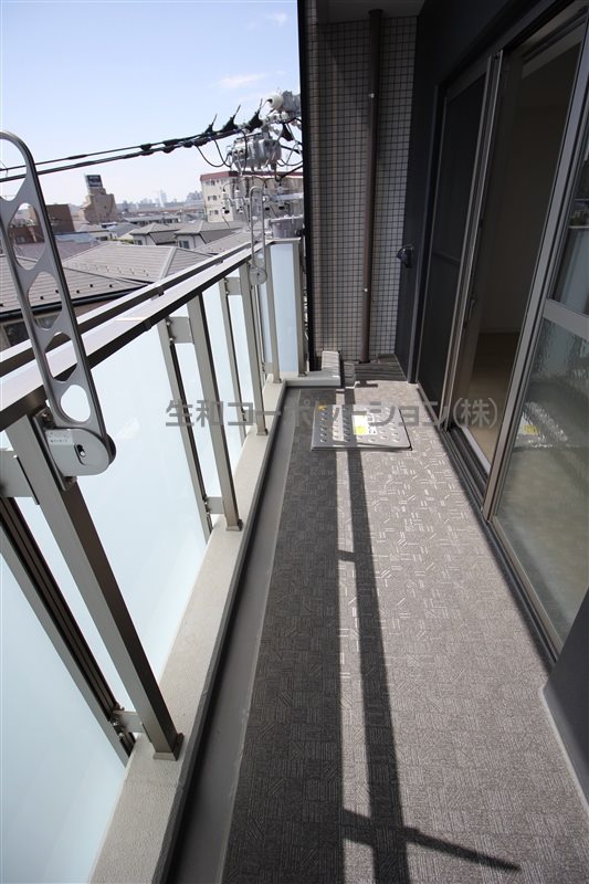 While 椿 ベランダ