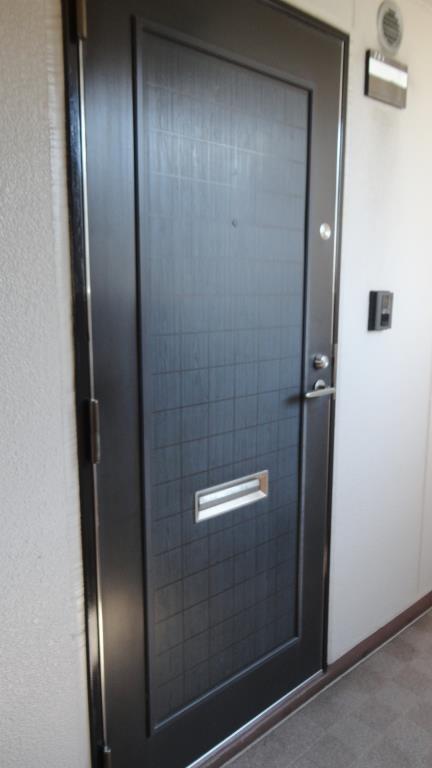 コウジィーコート忍ヶ丘 玄関