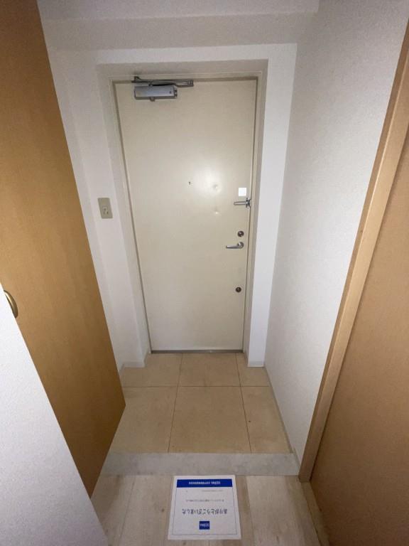 コンフォール平野 玄関