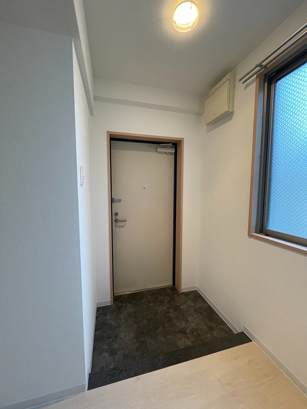 ルミエール堂ヶ芝 玄関