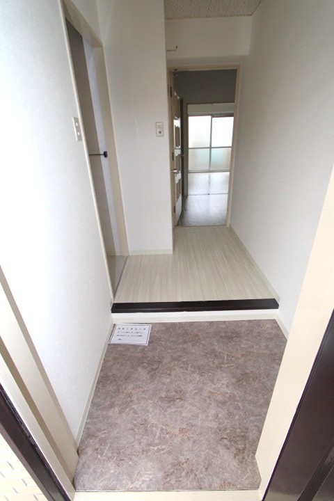 サンファーストウエダ 玄関
