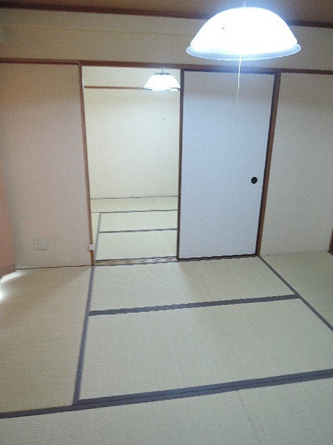 香里ロイヤルプラザ ベッドルーム