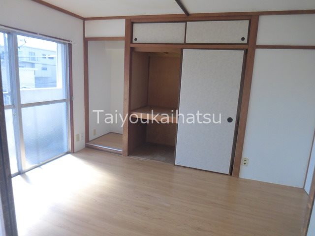 さえきビル ベッドルーム