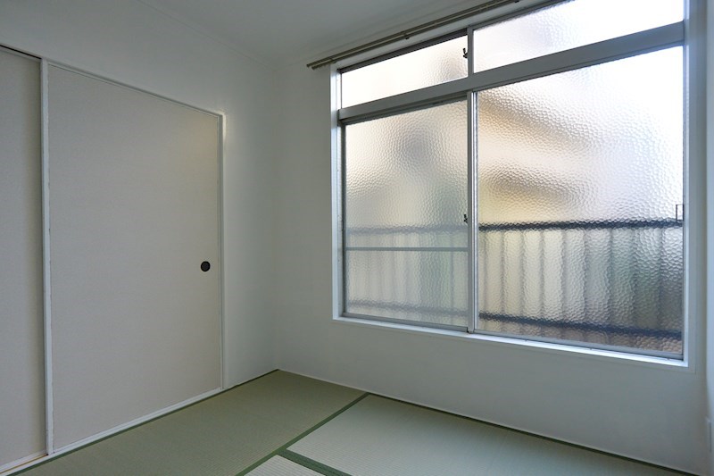 高田・岡田ハイツ ベッドルーム