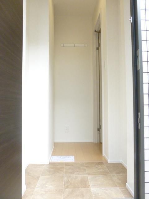 メゾンタカイシ 玄関