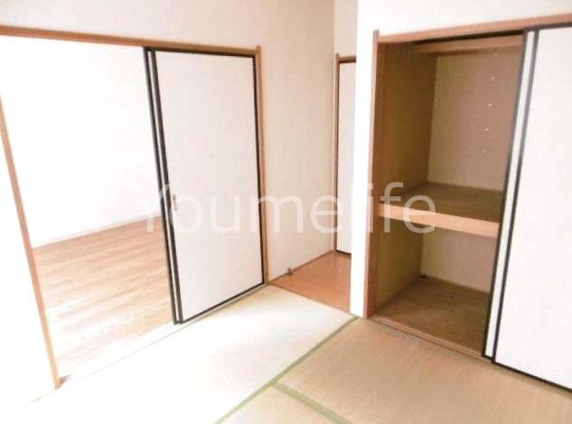 コーポマルマA棟 ベッドルーム