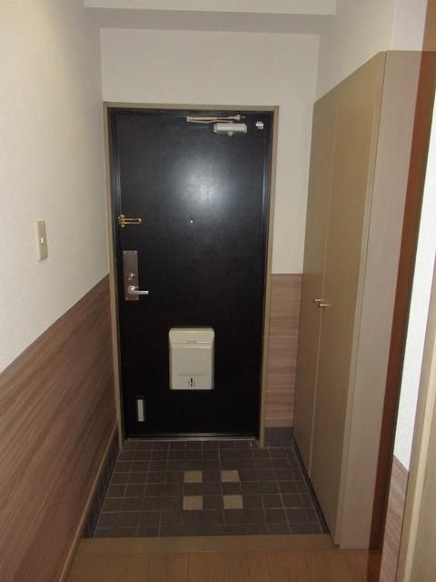 クイーンズタウンⅠ番館 玄関