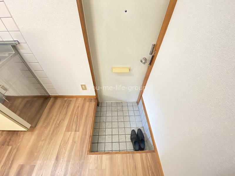 サンコーポラス曲松 玄関