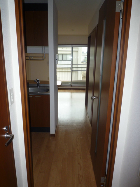 グランソレイユ　二子 玄関