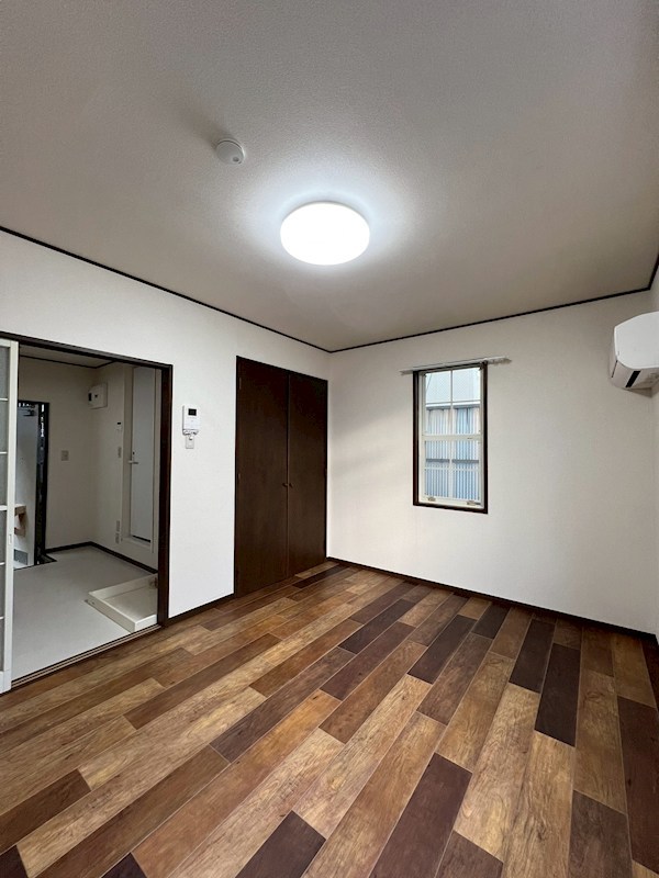 サンシャインホームコジマ ベッドルーム