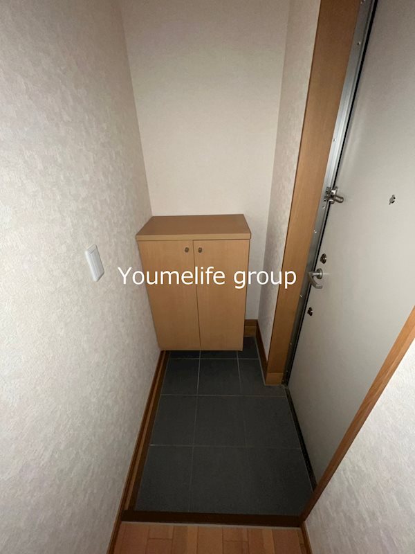 コンフォート辰己 玄関