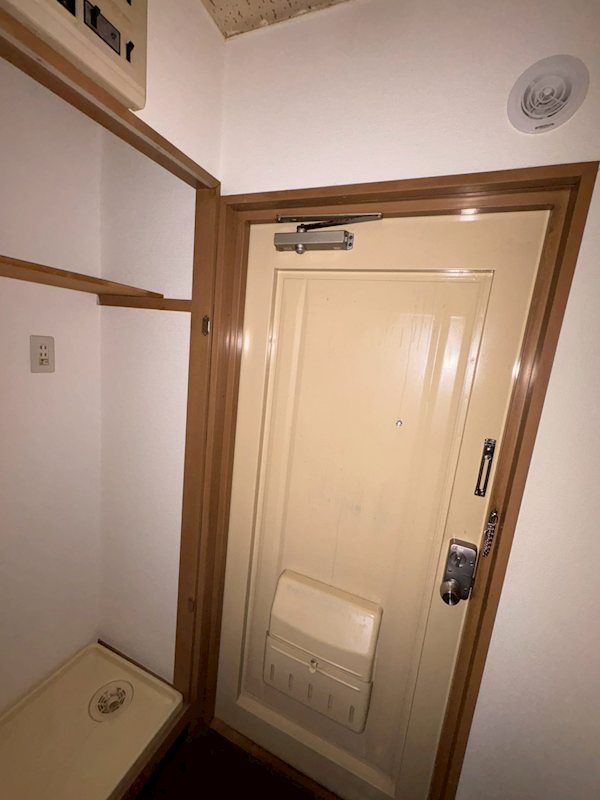 ツカコシビル 玄関