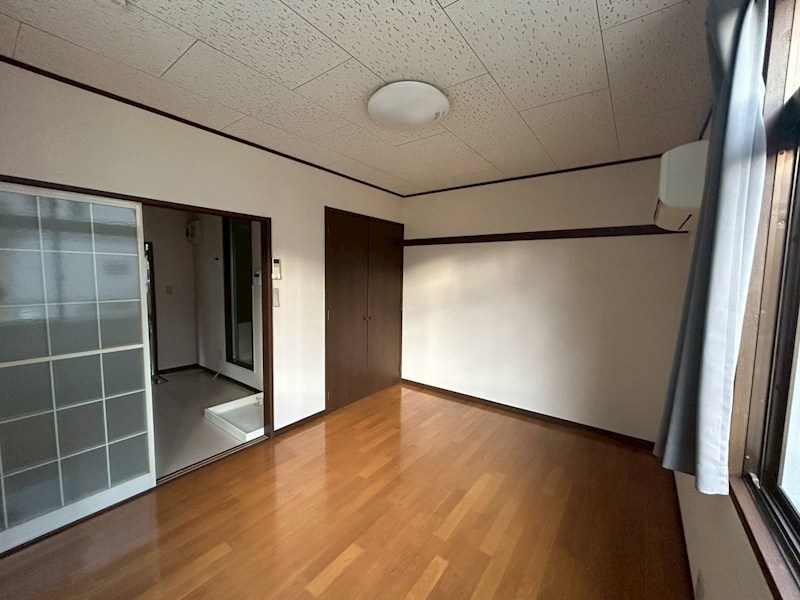 サンシャインホームコジマ ベッドルーム