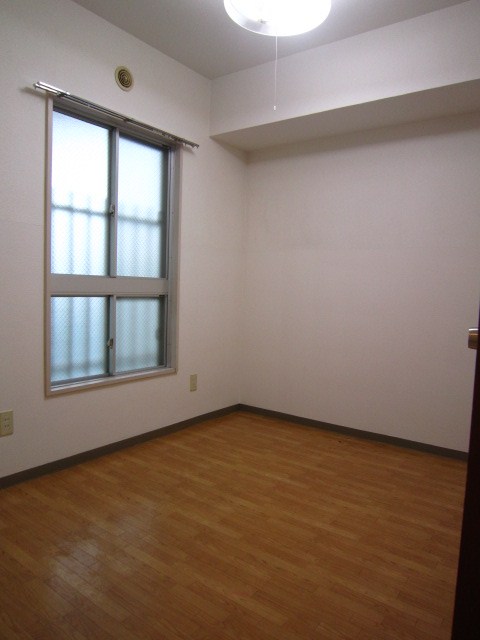 城山松本マンション ベッドルーム