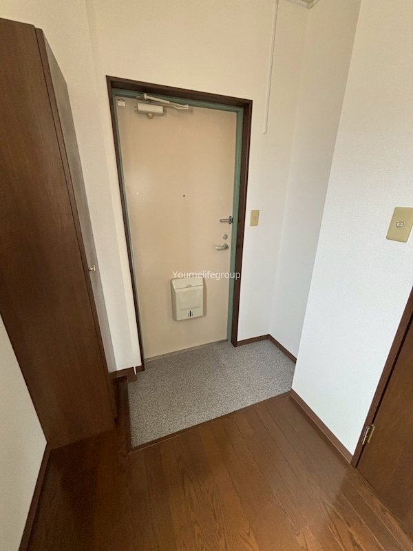 カナスカイビル 玄関