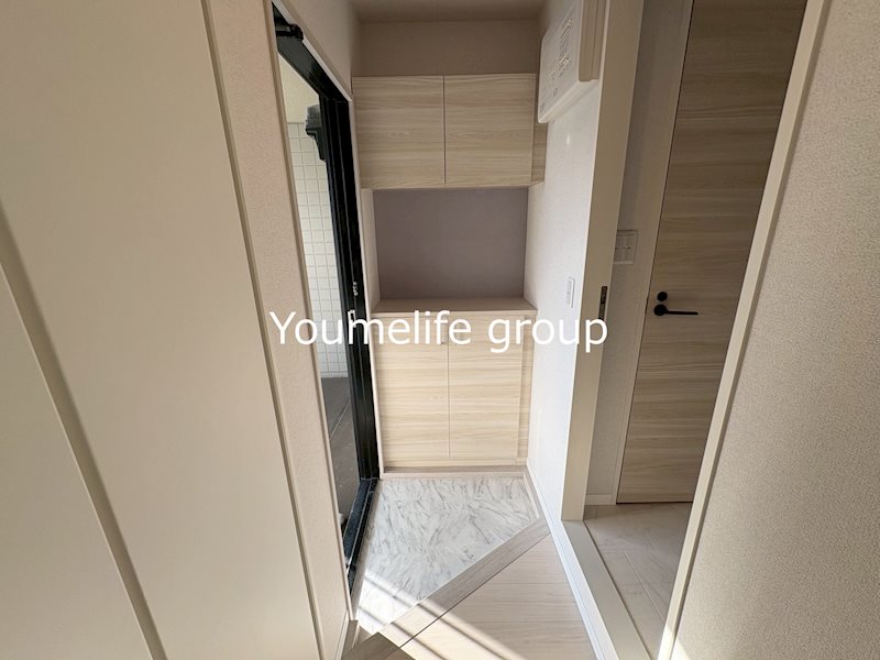 サンフロントあずま 玄関