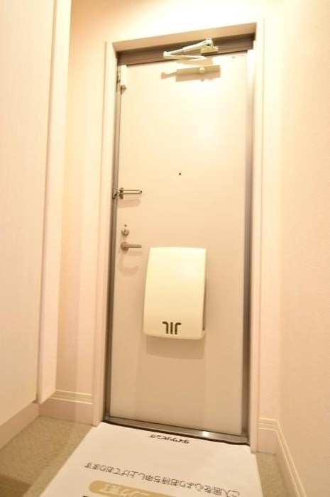 玄関 サンフローラ A棟 玄関