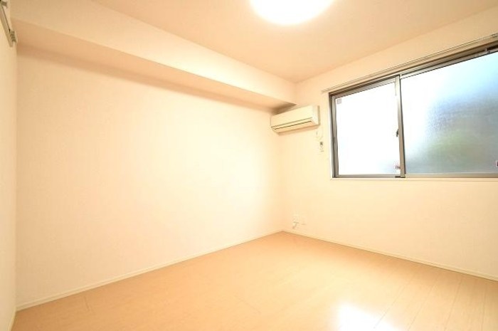 ベッドルーム サンフローラ A棟 ベッドルーム