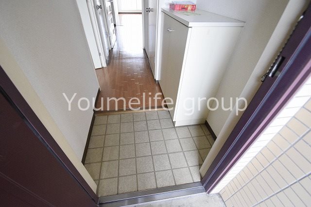 くりいむマンション 玄関