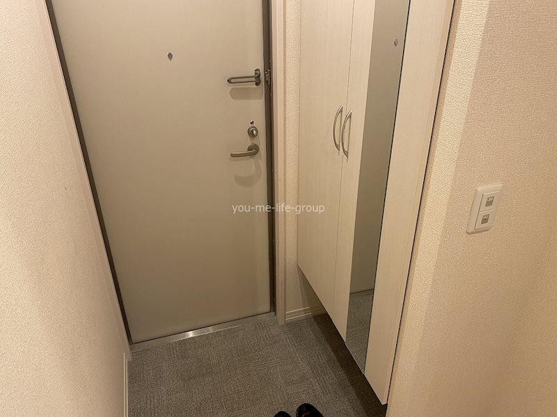 マオパレス愛甲石田 玄関