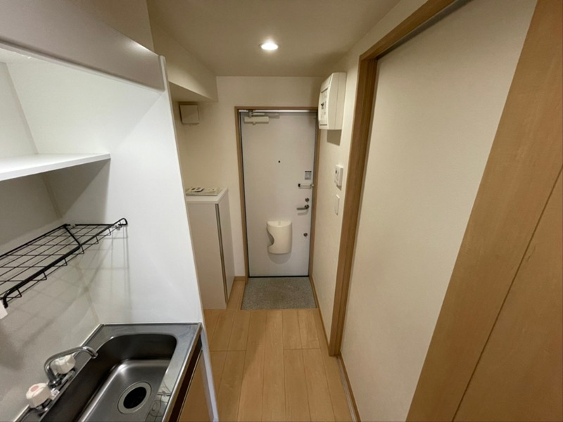 アルティスコート汲沢 玄関