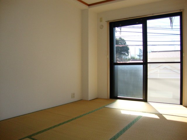 メゾンエクセル ベッドルーム