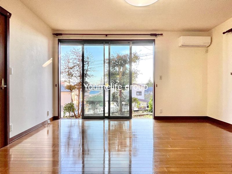 石田シャーウッド貸家 ベッドルーム