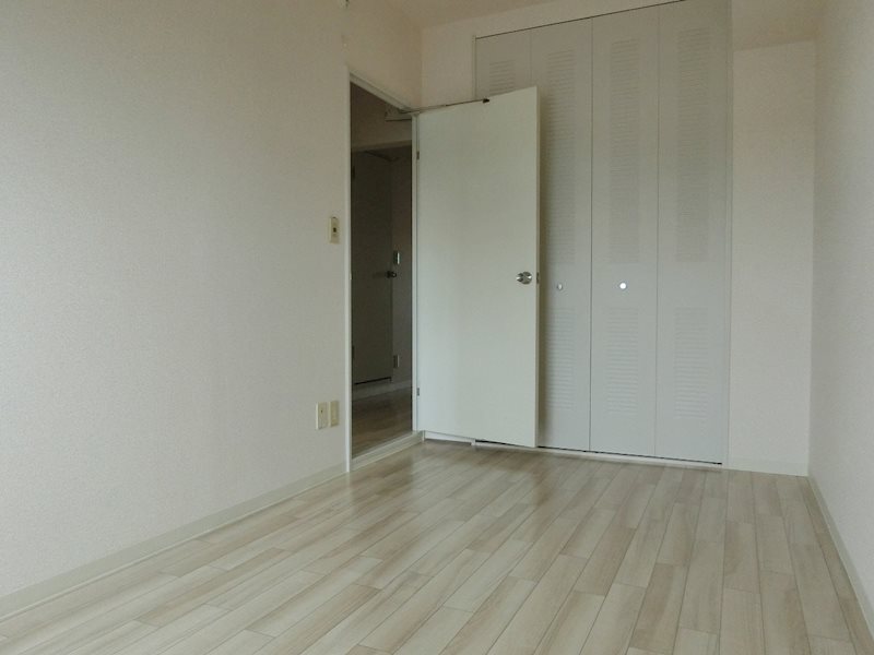 コウジィーコート ベッドルーム