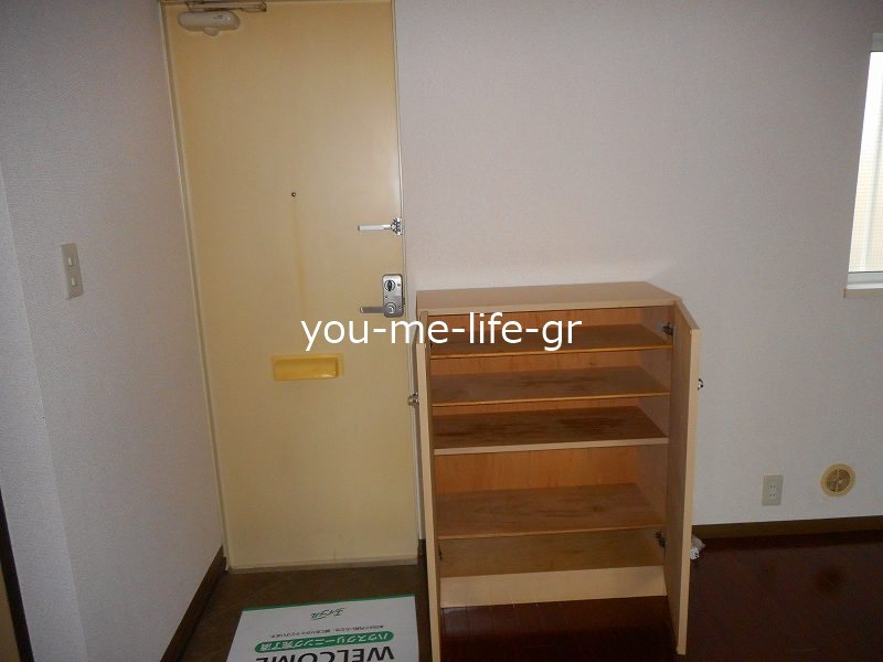 サンリバー纒 玄関