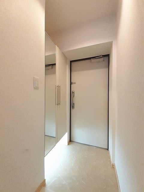 ドミール堤 玄関