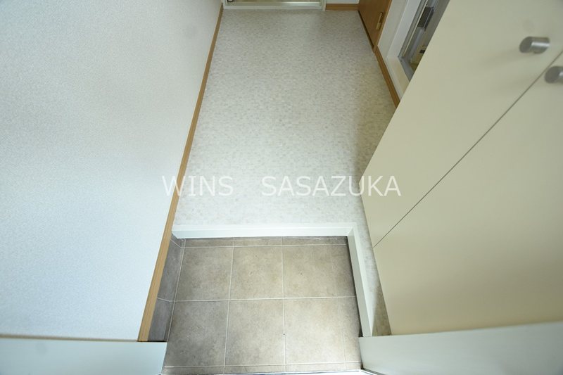 ホームズフリージア 玄関