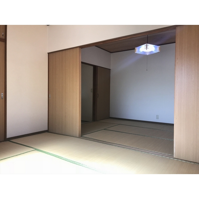 城南佐藤棟割アパート ベッドルーム