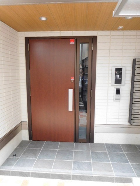  プレジールK 玄関