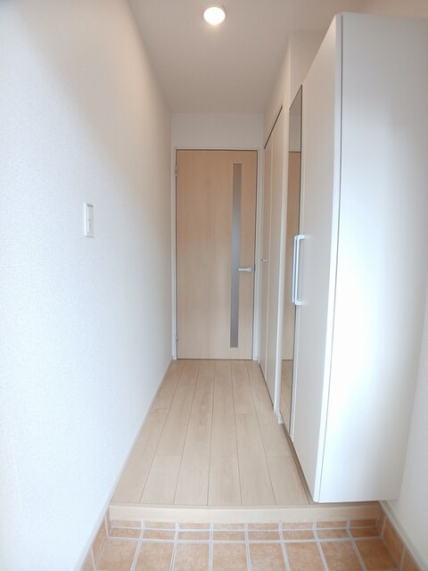 サンライズ　ムサシ 玄関