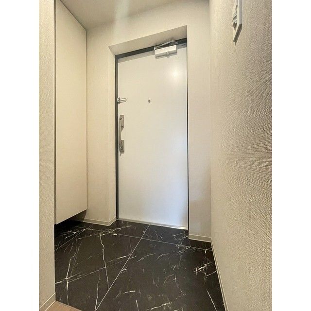 ウェルスクエア八幡山 玄関