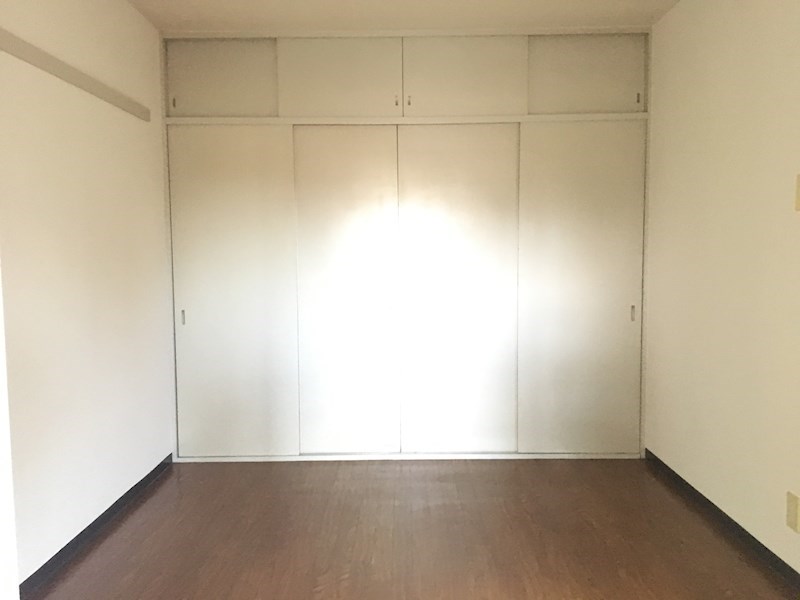 上阿達谷口マンション ベッドルーム