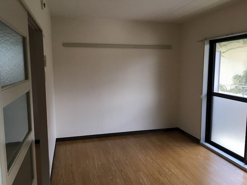 上阿達谷口マンション ベッドルーム