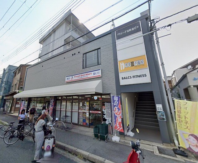 プリシード淀駅前ビル 玄関
